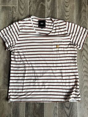 OBEY off-white pocket tee with brown and black stripes and embroidered logo